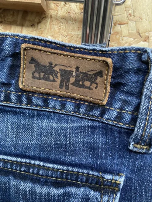 jean vintage levis 565 wide leg loose fit w30 bleu etiquette cuir